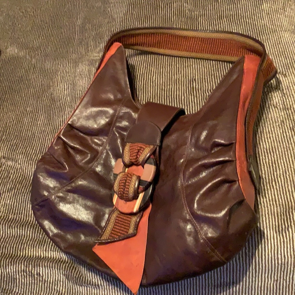 Vintage Limon Piel Gorgeous leather hobo style handbag with mixed media accents.